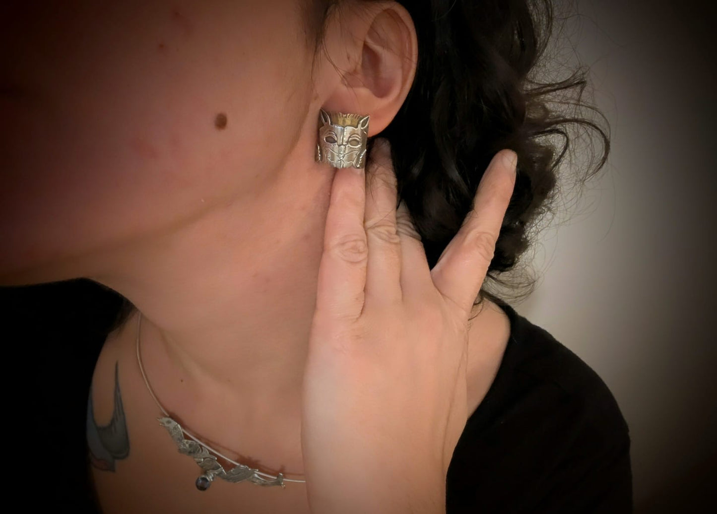 Orecchini creature capitelli della Basilica di San Michele Maggiore di Pavia